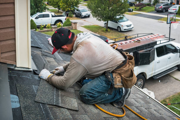 Professional Roofing technician working in Providence, RI